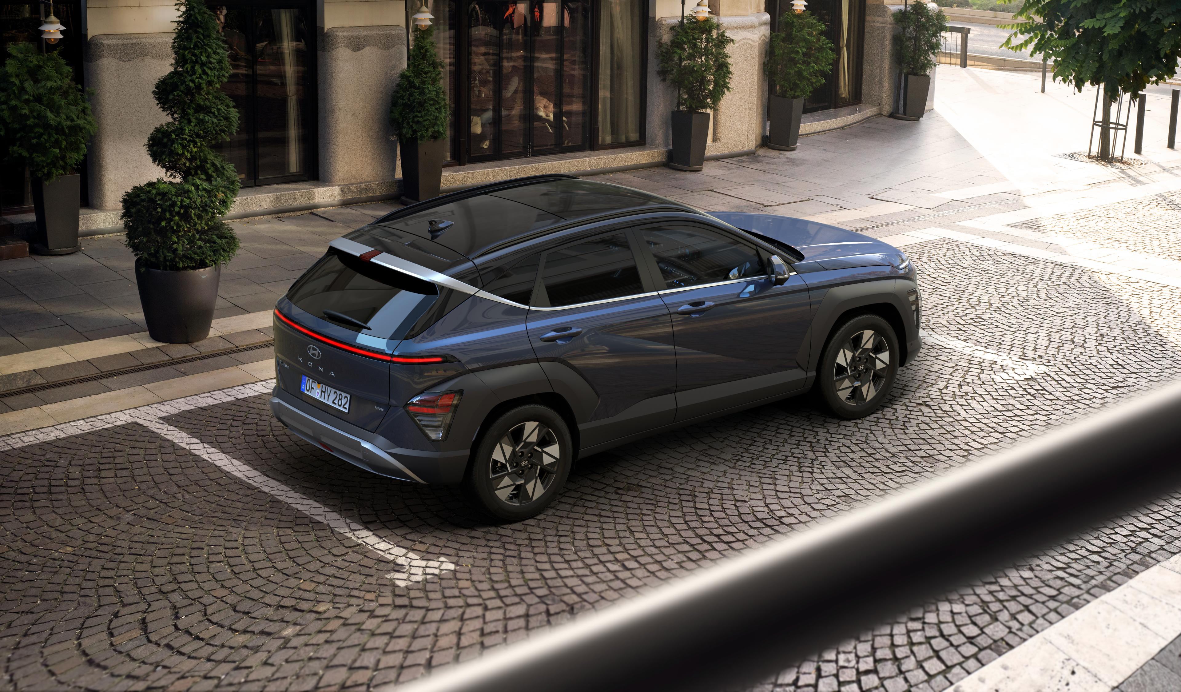 The rear tailgate of the all-new Hyundai KONA Hybrid showing the rear lights.