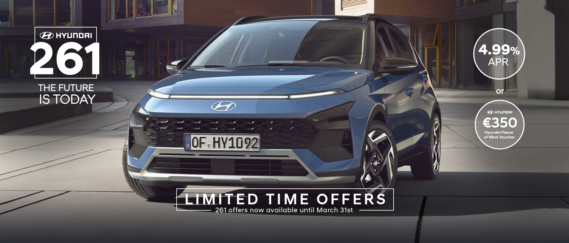 The new Hyundai BAYON is seen the front, with urban housing in the background.