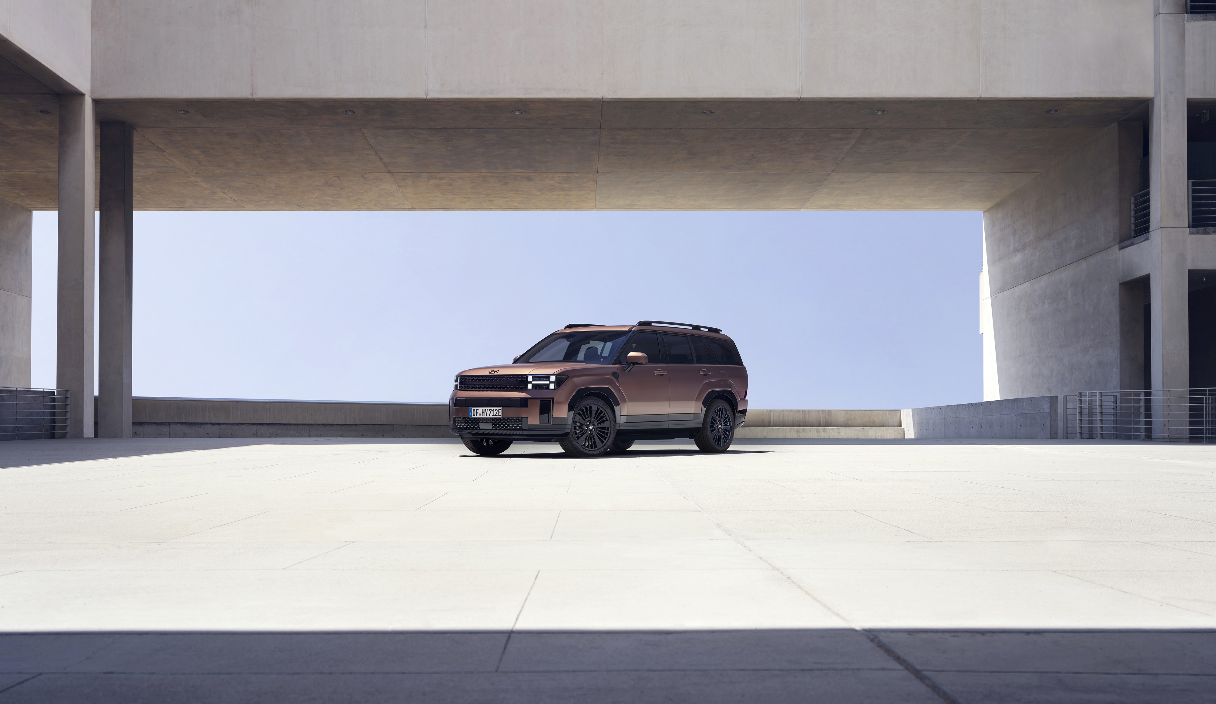 The Hyundai Santa Fe parked in an open garage.