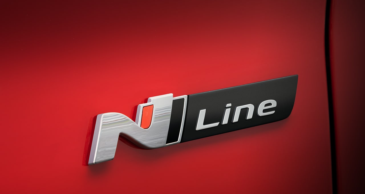 The N Line symbol in high relief of the Hyundai KONA N Line in red. 