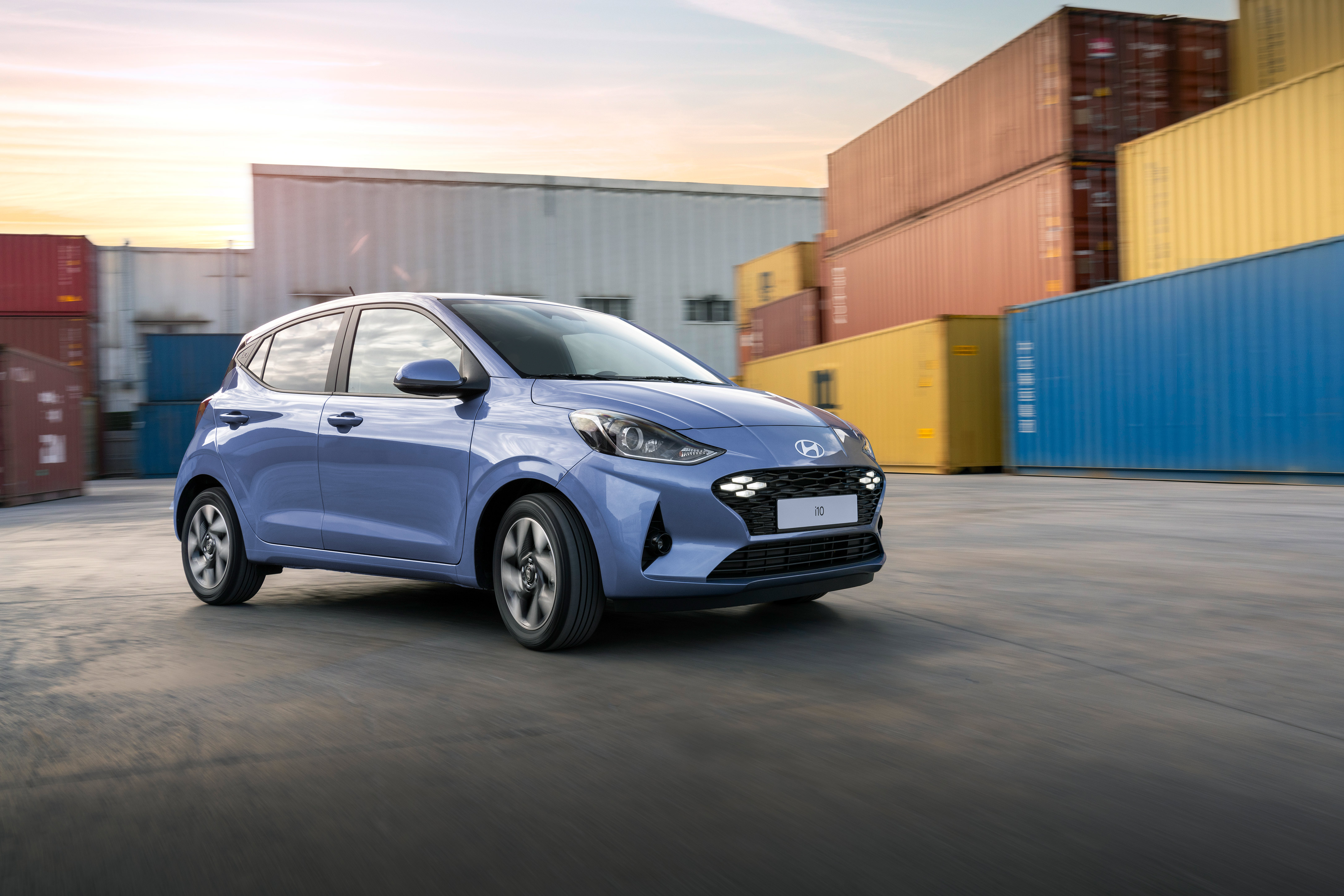 Woman in front of the Hyundai i10 N Line