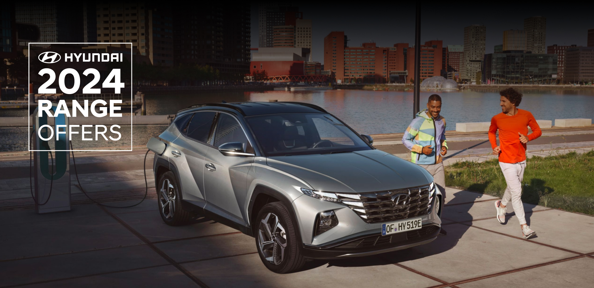 The all-new Hyundai TUCSON Plug-in Hybrid compact SUV parked near the ocean.